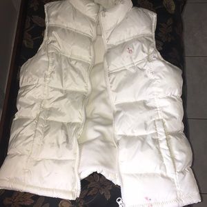 White old navy vest. Has two small stains.